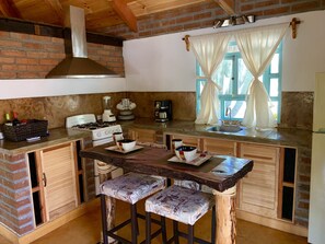 Family Cabin, Multiple Beds, Pool View | Private kitchen - Cabañas el Triunfo (El Triunfo)