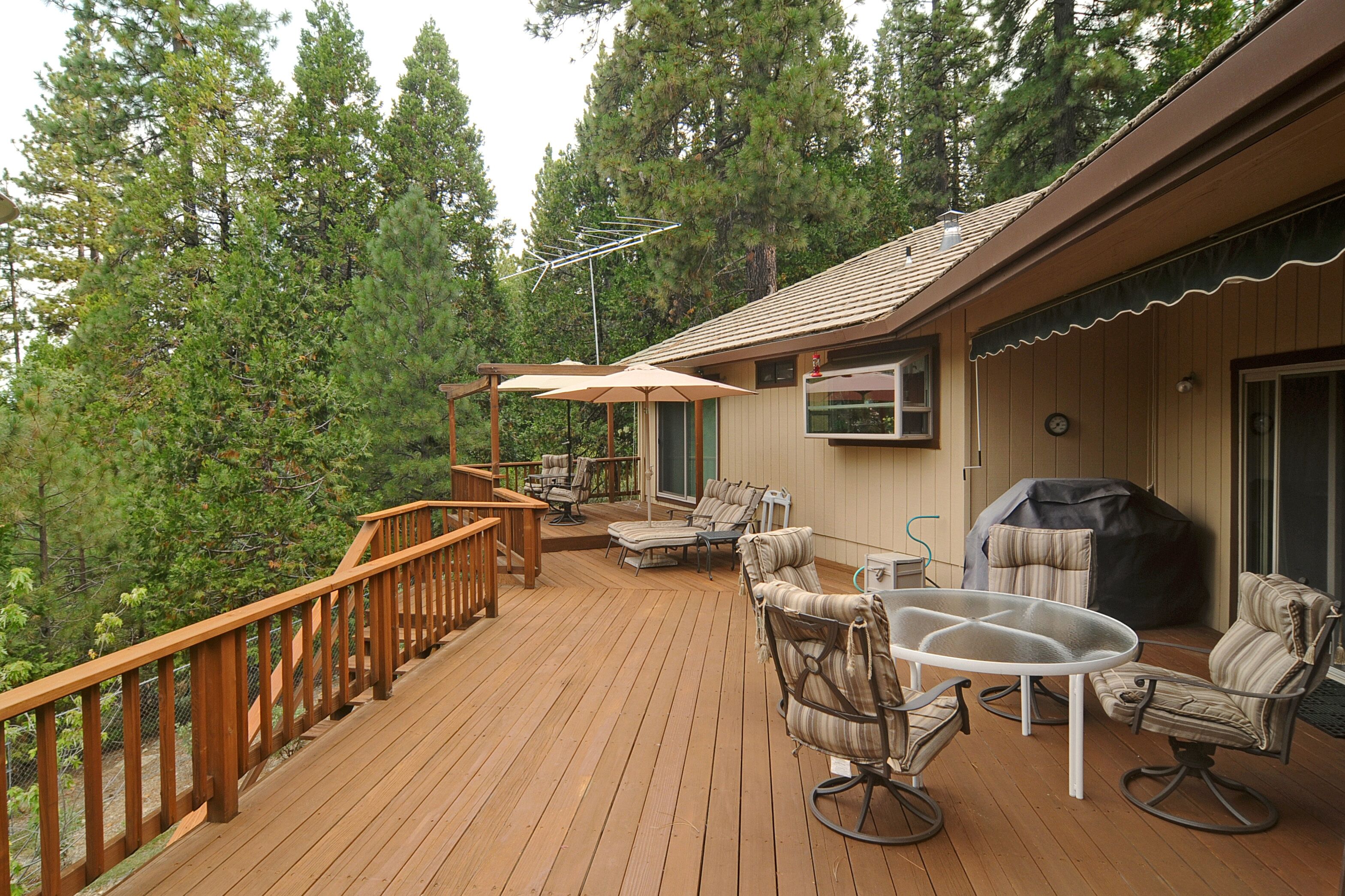 Large back deck has access from the Great Room, Master Bedroom and Guest room #2