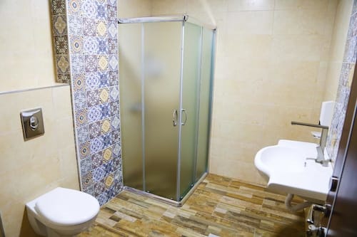 Shower, free toiletries, slippers, bidet