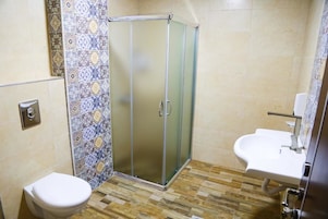 Shower, free toiletries, slippers, bidet