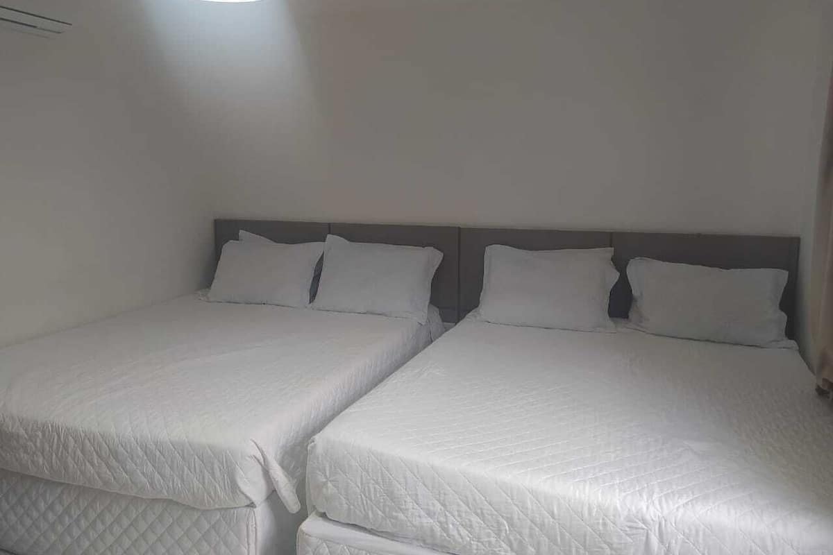 Standard Room, 2 Queen Beds | Individually decorated, individually furnished, blackout drapes