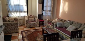 Apartment, 2 Bedrooms, Accessible, Beach View | Living area | 48-inch flat-screen TV with satellite channels, TV, Netflix - Amazing Apartment Beach View Next Hilton (Alexandria)