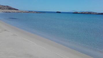 On the beach, beach towels