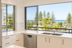 Fridge, microwave, oven, stovetop - Joanne Terrace 203 | Ocean Views & Kings Beach Escape (Caloundra)