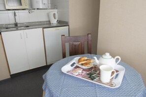 Microwave, coffee/tea maker, cookware/dishes/utensils