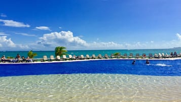 Outdoor pool, free pool cabanas, pool umbrellas