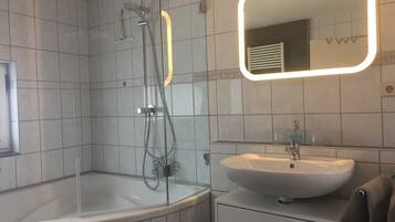 Hair dryer, towels, soap, toilet paper