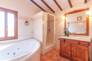 Bathtub, hair dryer, towels