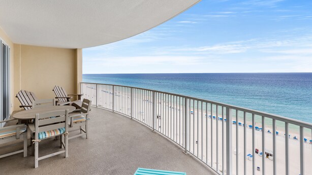 A balcony with a view of the beach and ocean. - Spectacular Ocean Villa END Unit 1001 - Coastal Decor and Endless Views! (Panama City Beach)