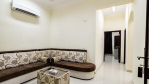32-inch flat-screen TV with satellite channels, TV