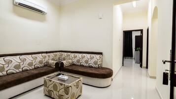 32-inch flat-screen TV with satellite channels, TV