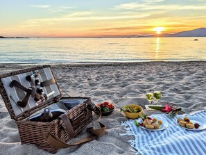 On the beach, sun-loungers, beach towels