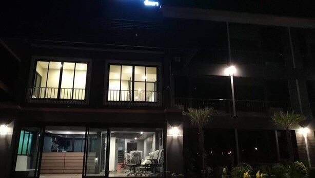 A building with a sign reading "NITTA". - Nitta Ville (Hang Chat)