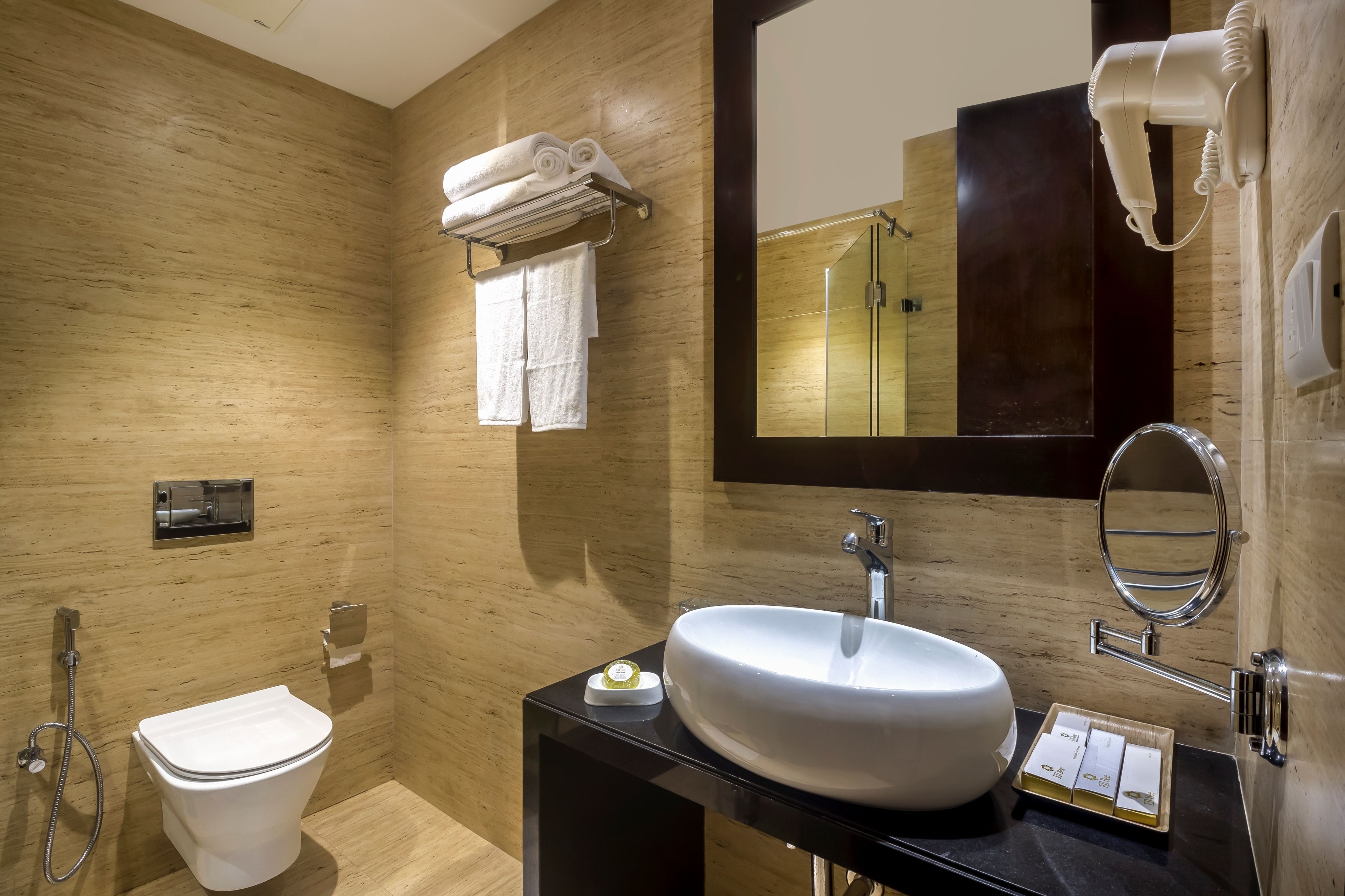 deluxe room | bathroom | shower, rainfall showerhead, free toiletries, hair dryer