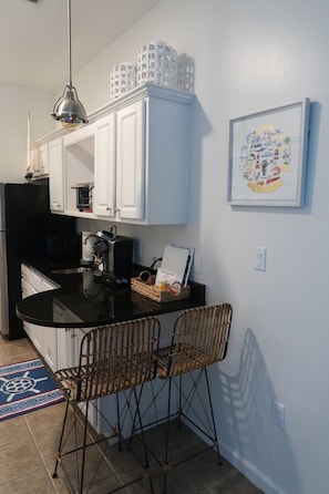Fridge, microwave, coffee/tea maker, toaster