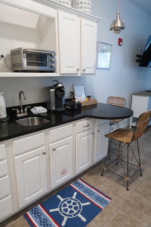 Fridge, microwave, coffee/tea maker, toaster
