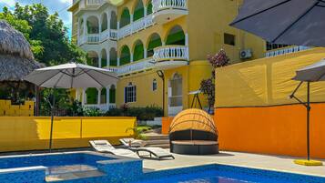 Outdoor pool, open 9:00 AM to 8:30 PM, free cabanas, pool umbrellas