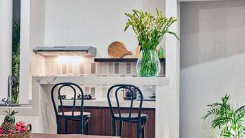 Fridge, microwave, stovetop, coffee/tea maker