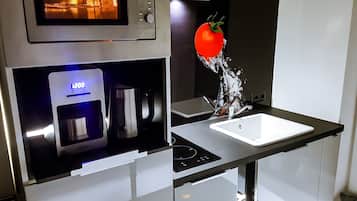 Fridge, microwave, stovetop, coffee/tea maker