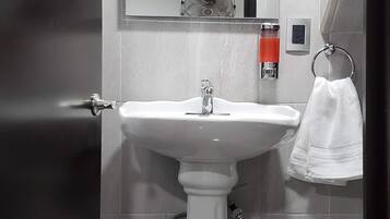 Shower, towels, soap, toilet paper