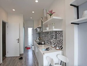 Basic Studio, 1 Queen Bed, Lake View | Private kitchen | Fridge, microwave, stovetop, electric kettle - Hanoi Home 2 - Lake view Apartment (Hanoi)