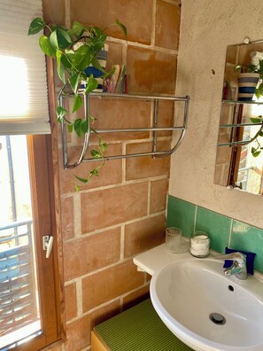 Combined shower/tub, hair dryer, towels, toilet paper