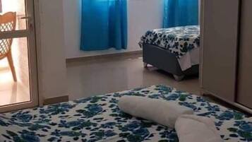 Desk, blackout drapes, soundproofing, free WiFi