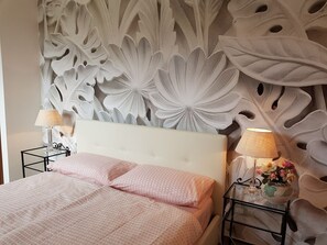 2 dormitorios, tabla de planchar con plancha, wifi gratis y ropa de cama
