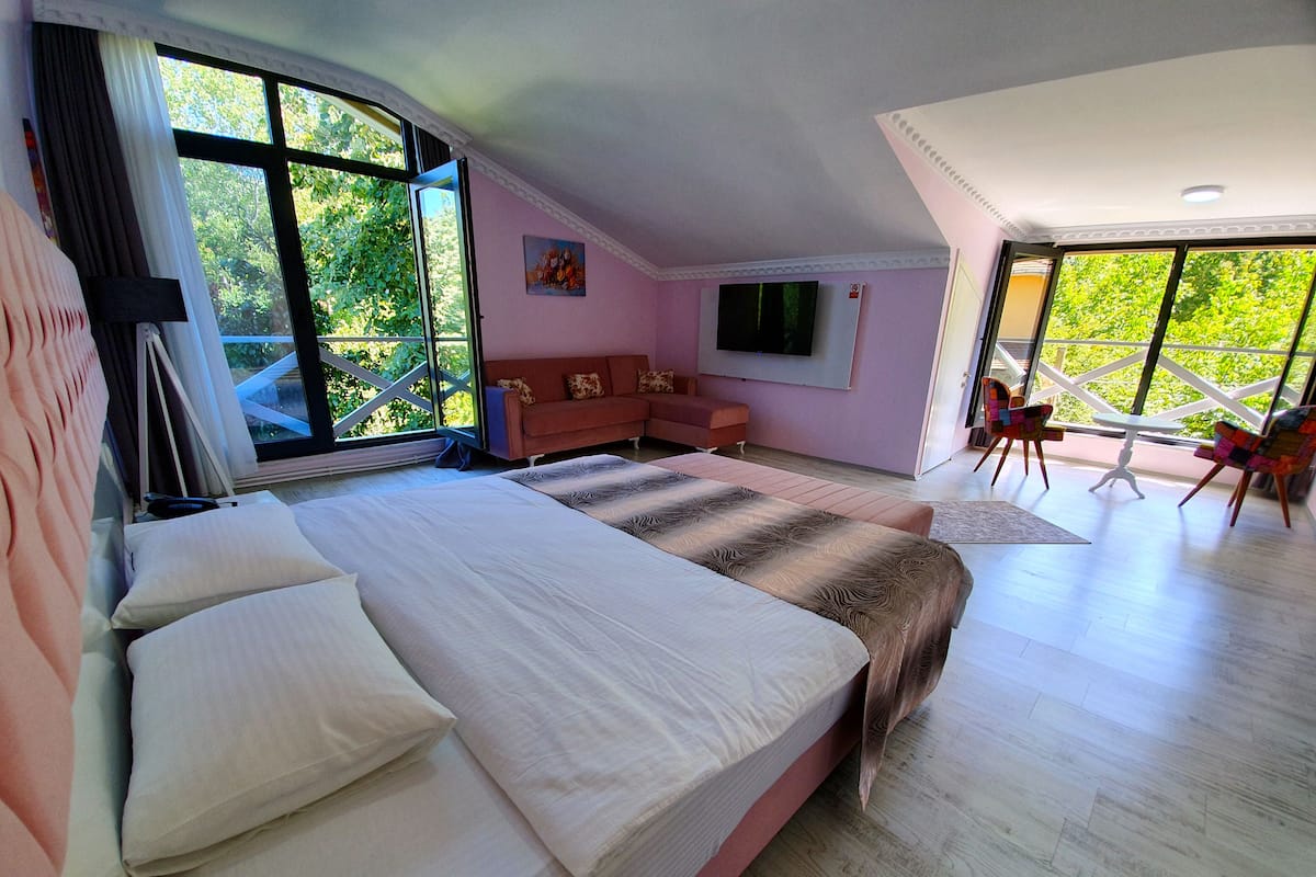 Deluxe Triple Room, Multiple Beds, Mountain View | 1 bedroom, minibar, desk, blackout drapes