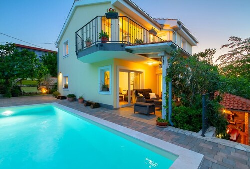 Modern Villa Meline with an outdoor pool and grill on Krk