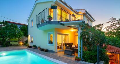 Modern Villa Meline with an outdoor pool and grill on Krk