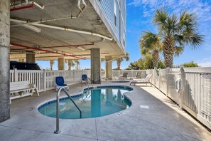 Outdoor pool - Ambassador Villas 203, Spacious 8 BR Beach Front Condo with a Swimming Pool and Hot Tub (NORTH MYRTLE BEACH)