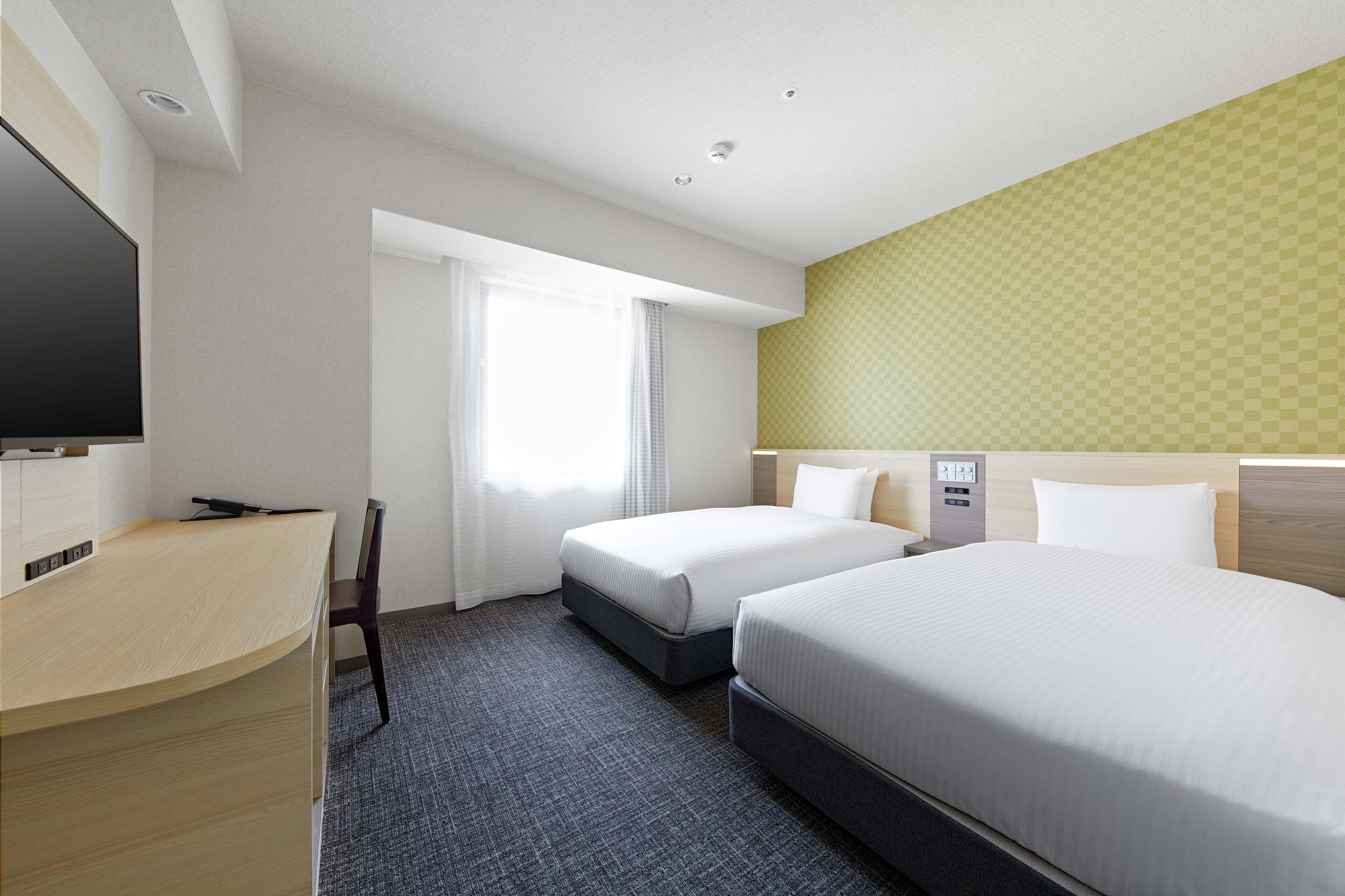 Chambre Deluxe avec lits jumeaux, non-fumeur | Literie de qualité, couette en duvet, bureau