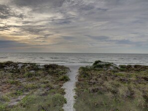 On the beach, sun-loungers, beach towels
