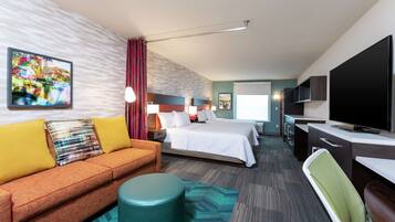 Desk, laptop workspace, blackout drapes, iron/ironing board