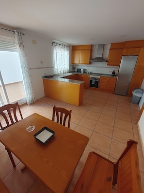 Fridge, microwave, oven, stovetop - Vip Resort area, vacation home, where you can enjoy and relax. (Villalonga)