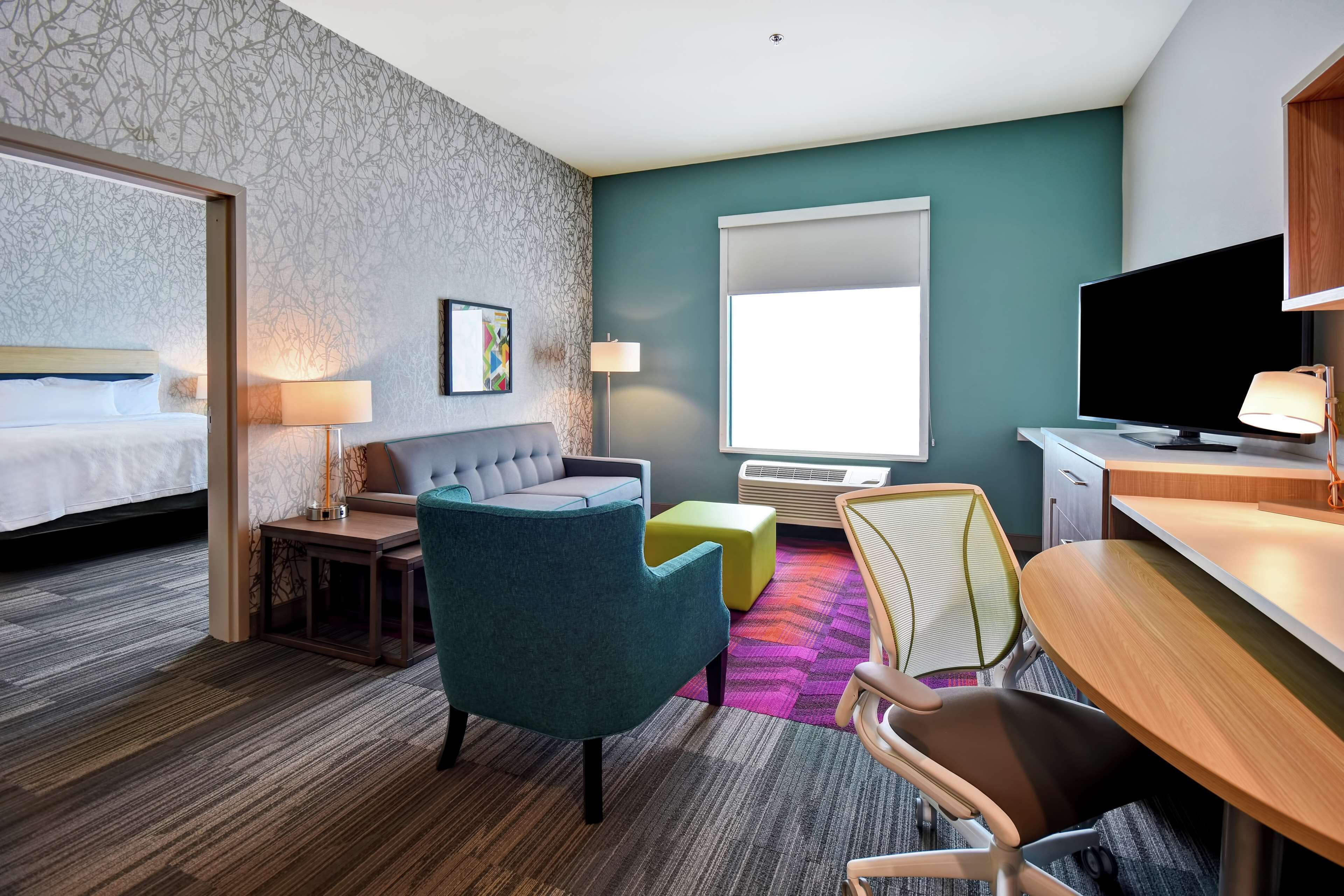 desk, laptop workspace, blackout curtains, iron/ironing board