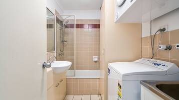Shower, hair dryer, towels