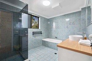 Shower, hair dryer, towels