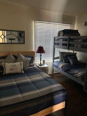 2 bedrooms, desk, iron/ironing board, travel crib