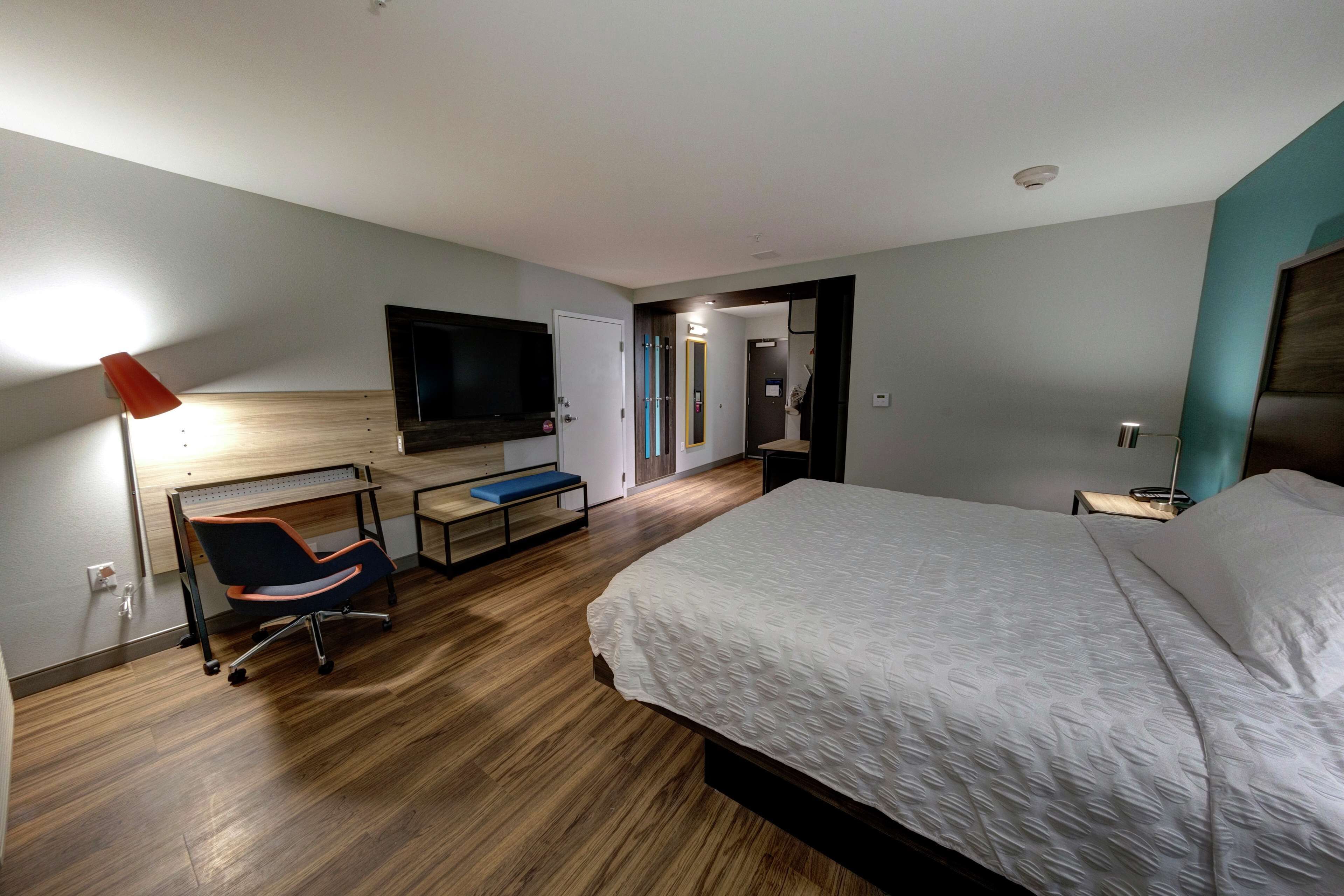 desk, blackout curtains, iron/ironing board, free cots/infant beds