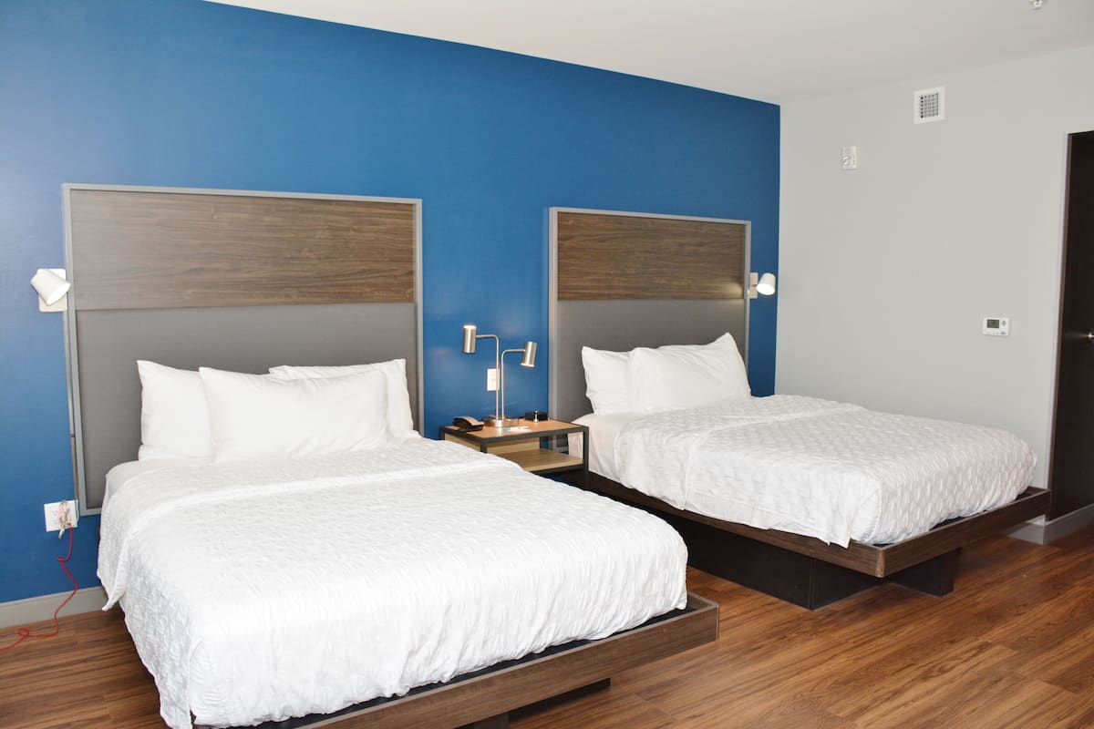 desk, laptop workspace, blackout curtains, iron/ironing board