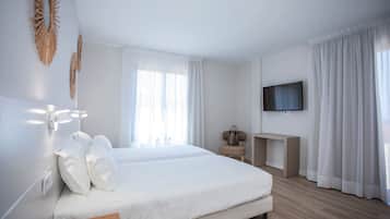 Premium bedding, down comforters, in-room safe, soundproofing
