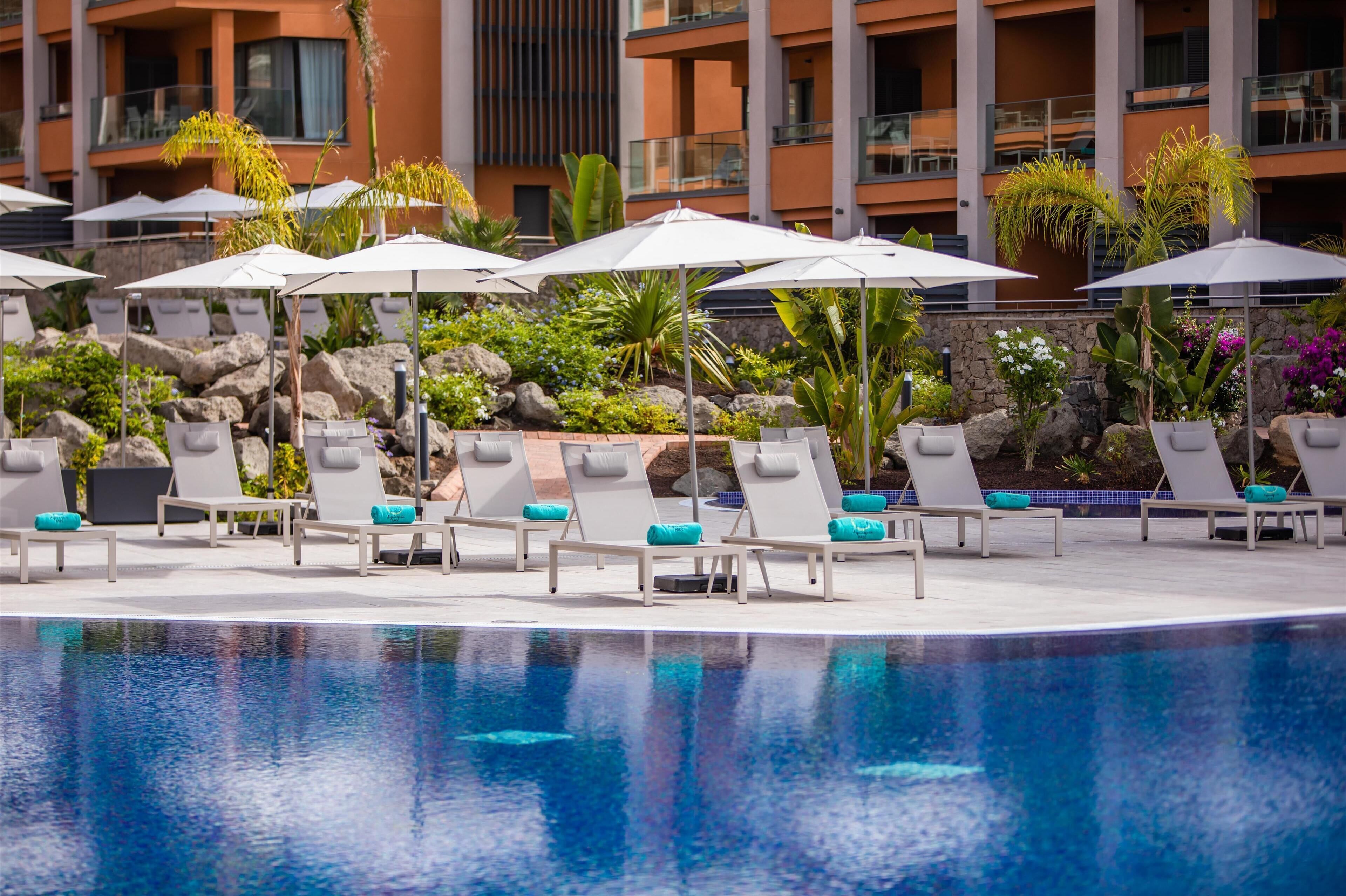 2 outdoor pools, pool umbrellas, sun loungers