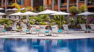 2 outdoor pools, pool umbrellas, pool loungers