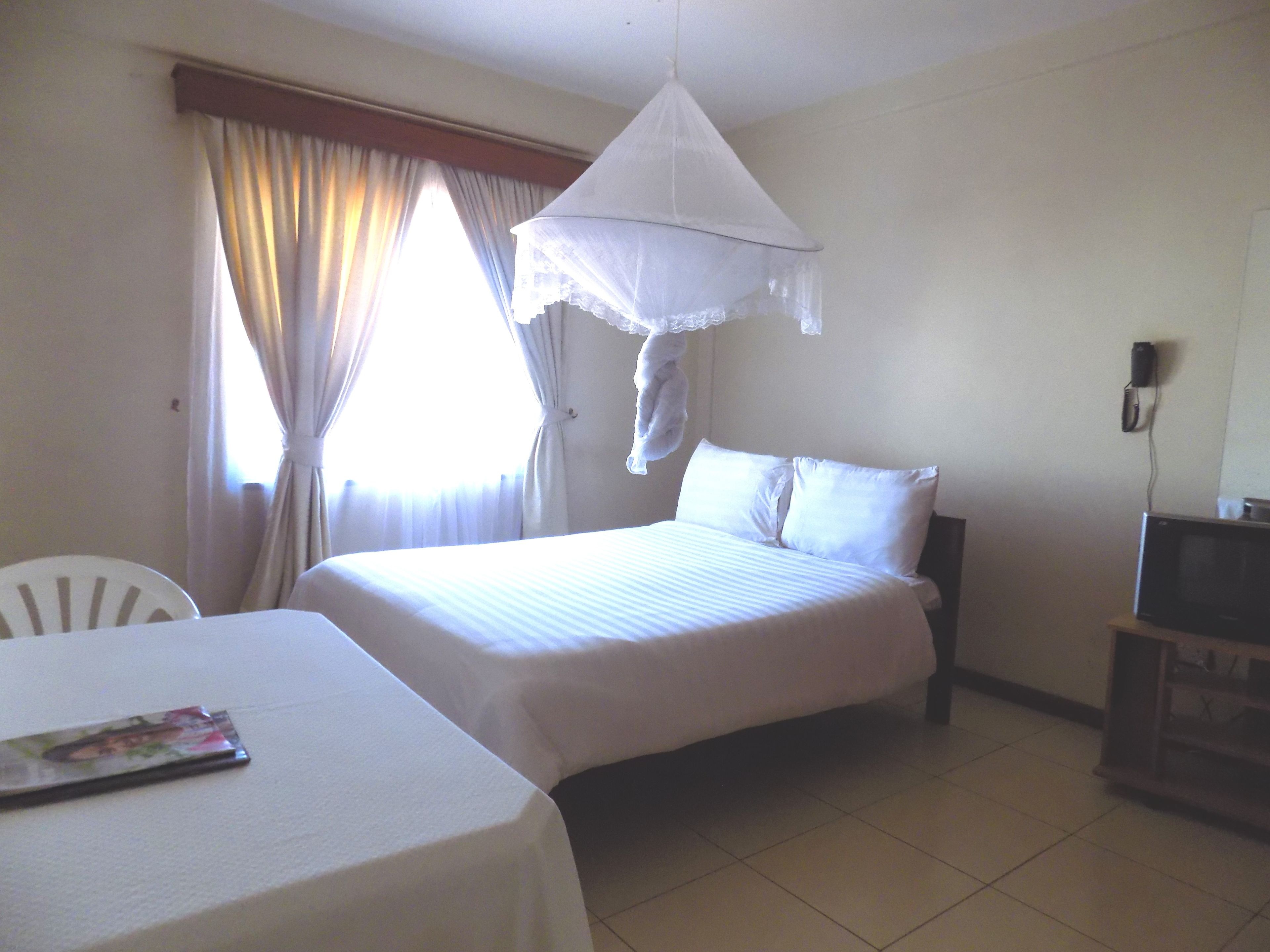 Habitación doble Deluxe, 1 cama matrimonial | Ropa de cama de alta calidad y decoración personalizada 