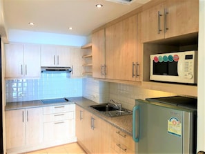 Apartment | Private kitchen | Fridge, microwave, stovetop, coffee/tea maker - Metro Jomtien Condotel - Sleeps 2 (Pattaya)