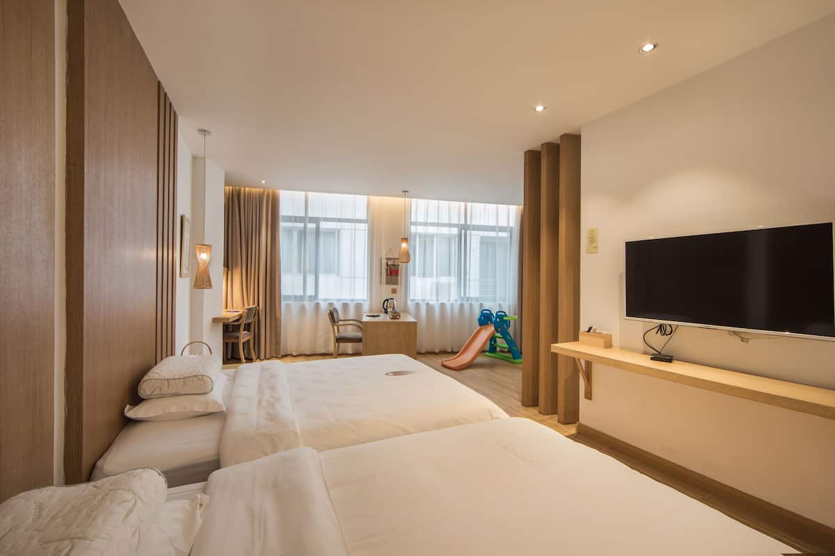 Family Room | Desk, blackout curtains, soundproofing, free WiFi