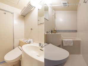 A modern bathroom with a toilet, sink, and shower. - Hotel Relief Kokura Annex (Kitakyushu)