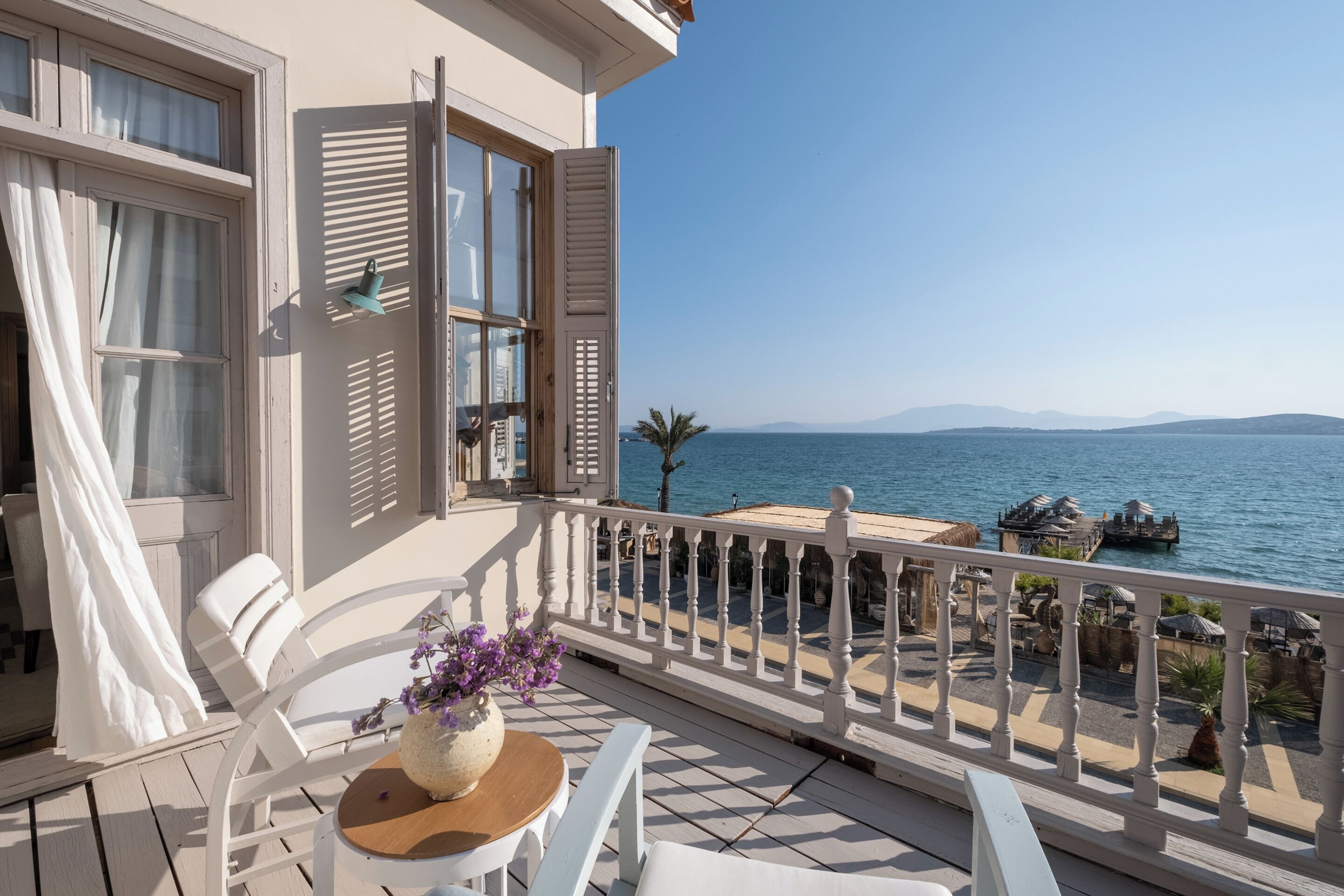 panoramic suite, 1 king bed, sea view, beachfront | 1 bedroom, in-room safe, individually decorated, individually furnished